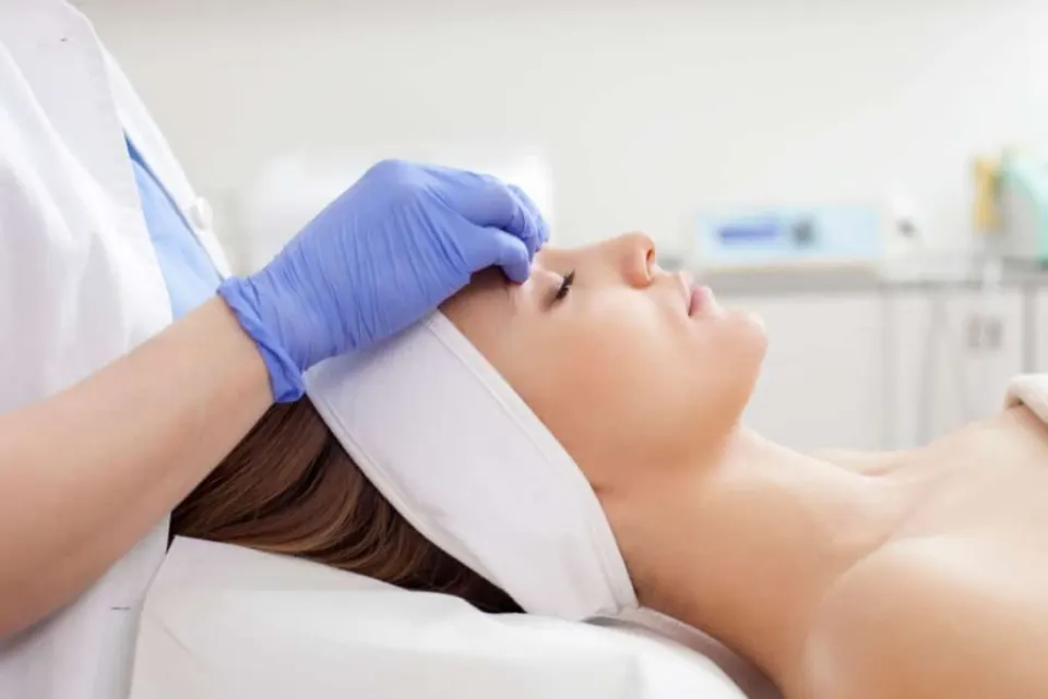 A patient receiving treatment around the eye area